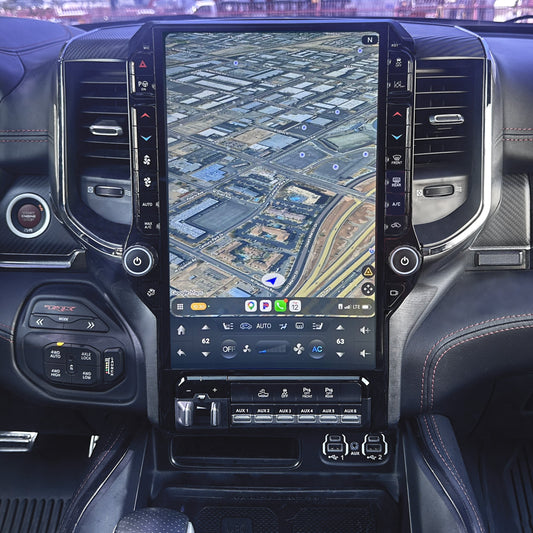Car interior with a large touchscreen display showing a map.